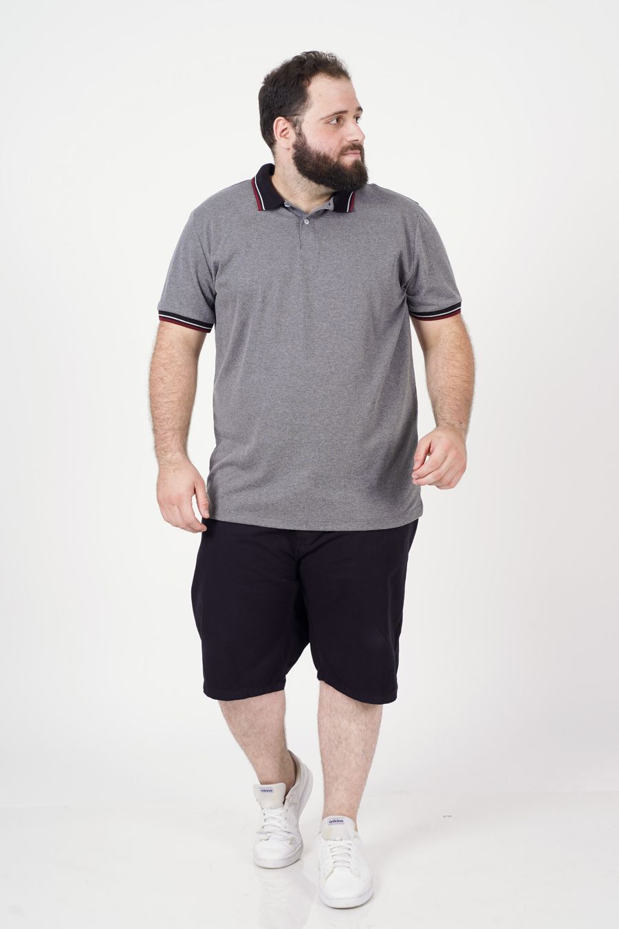 Polo  com frizo na gola e punhos plus size preto